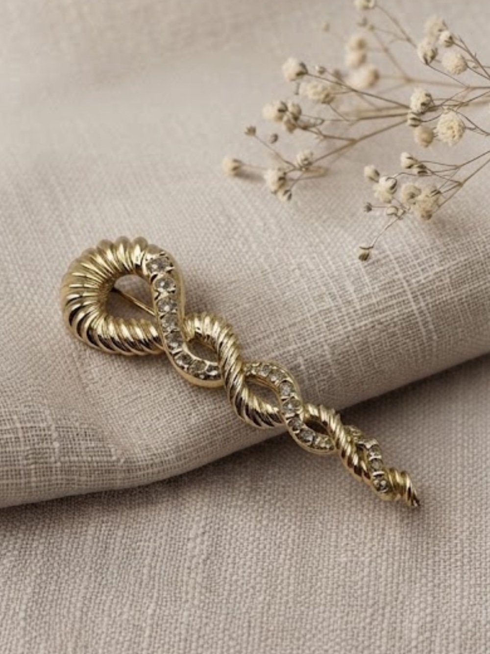 Vintage Gold Tone & Rhinestone Ribbon Swirl Brooch